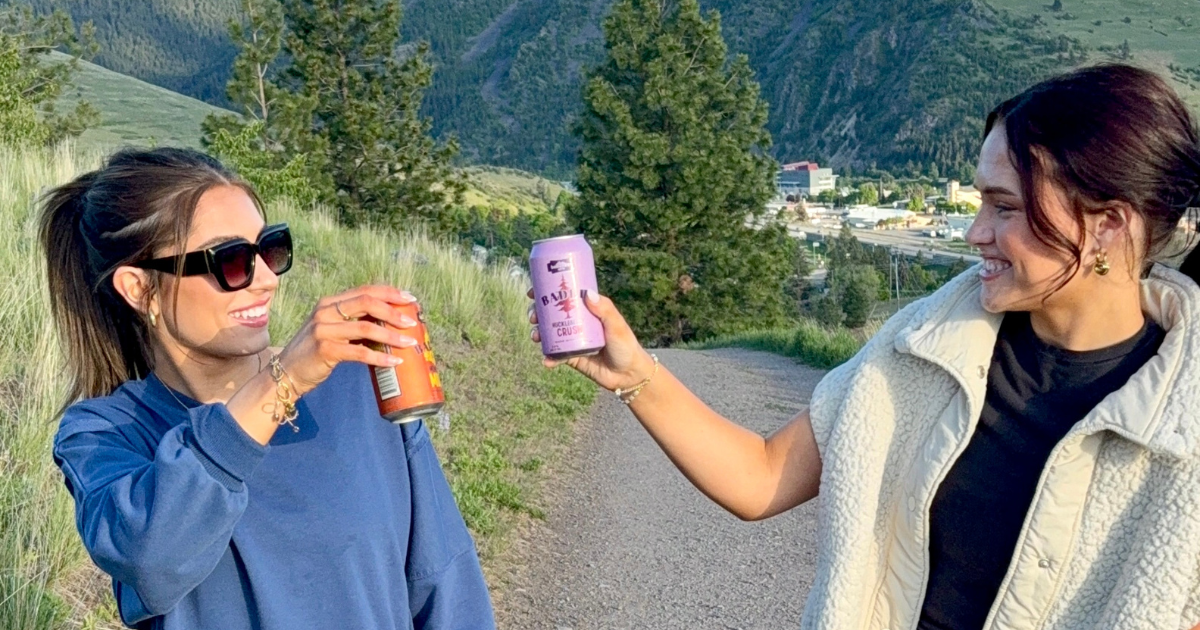 Sunset view from Waterworks Hill over Missoula Montana in June with our favorite canned cocktails